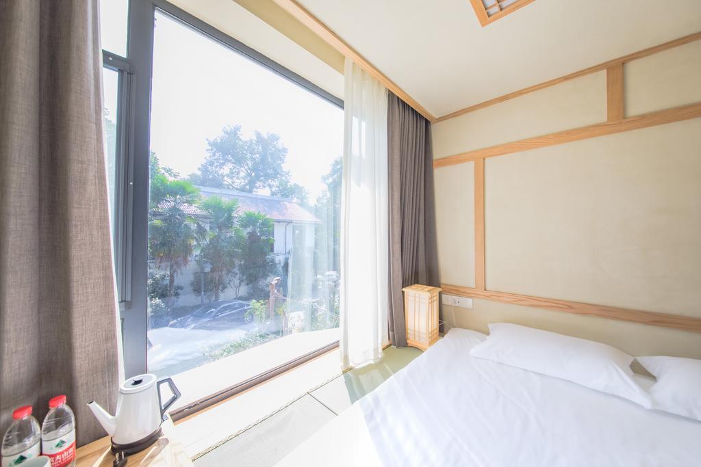 Hangzhou Van Wind Inn מראה חיצוני תמונה