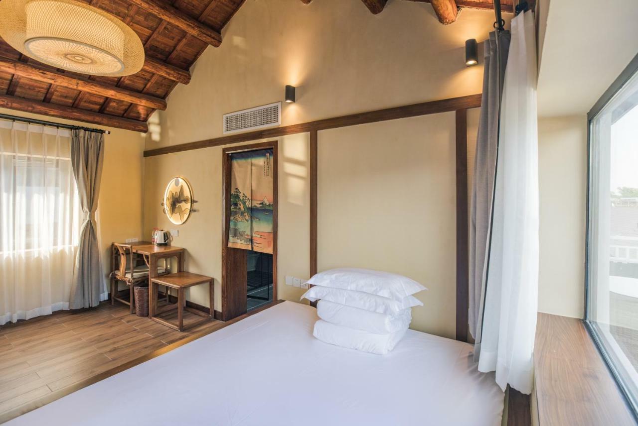 Hangzhou Van Wind Inn מראה חיצוני תמונה
